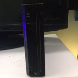 This is a black wii with all the cords needed
